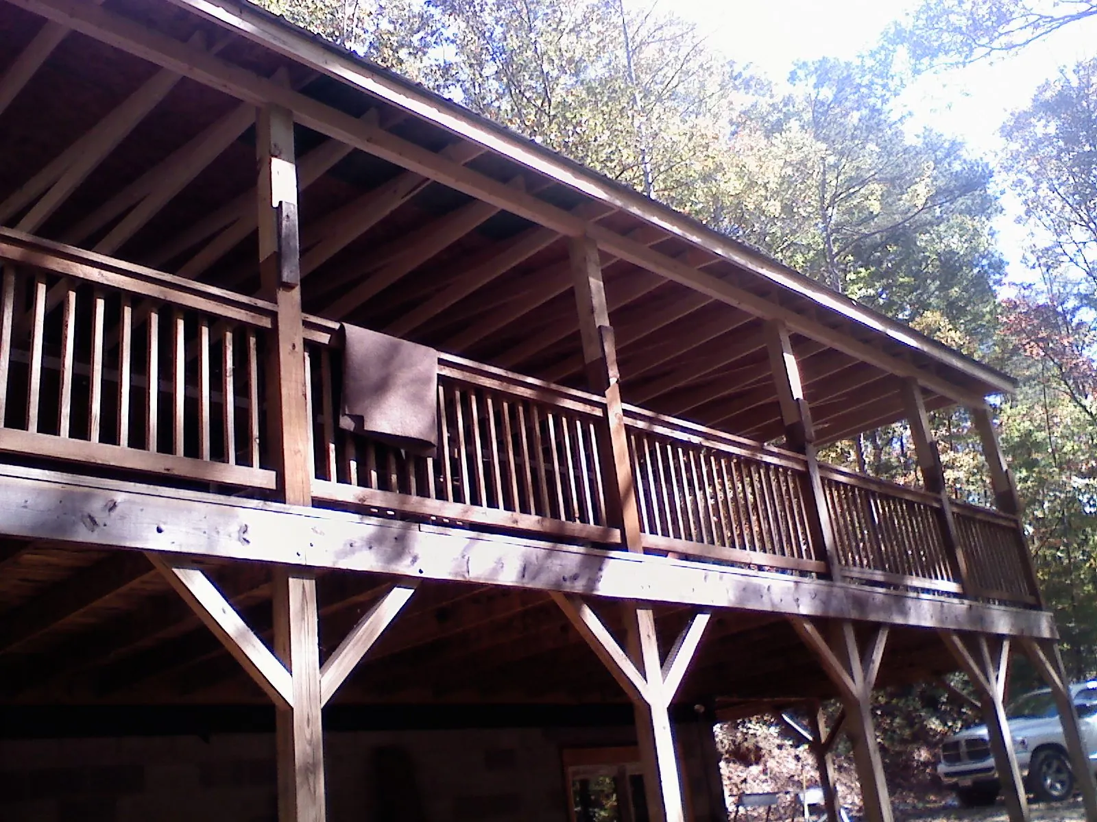 Timber framing under a new elevated porch and deck — Roof Leak Repair in Carlock by Roofing Brothers